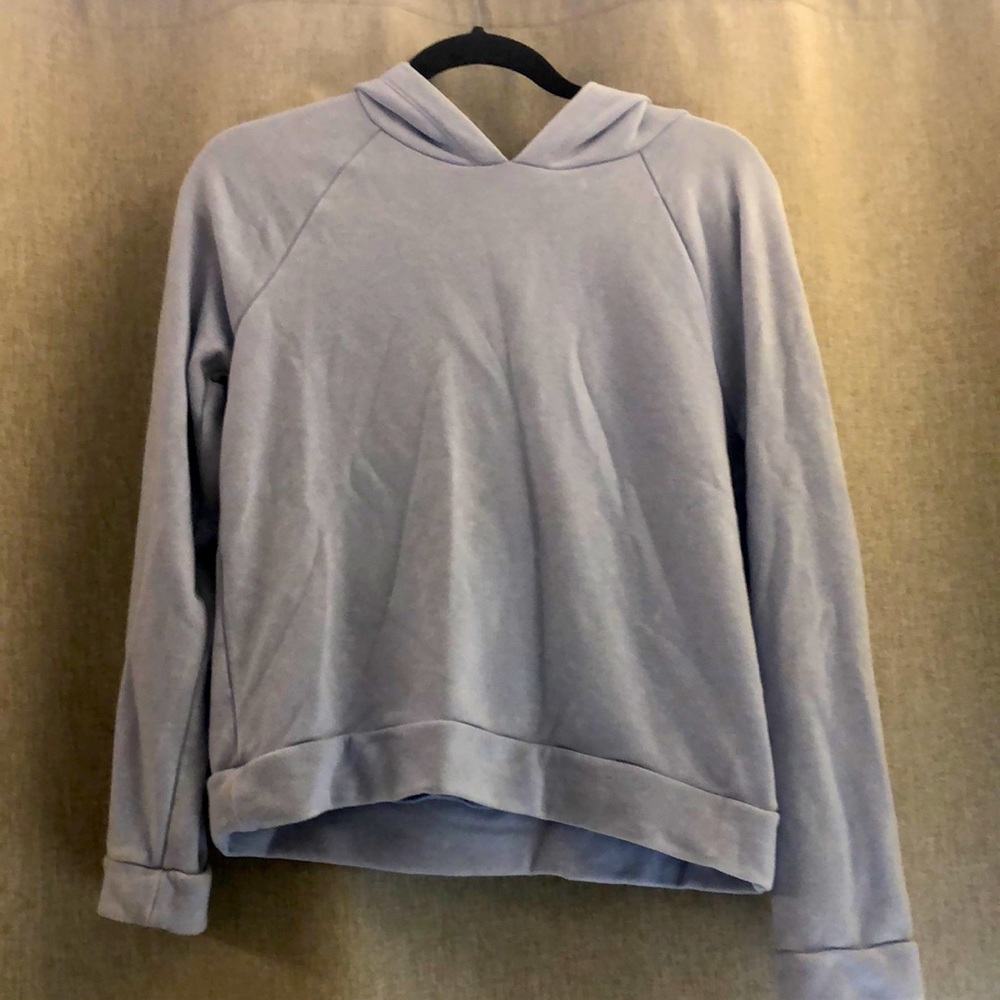 This is a light purple hoodie and is a size XL 14/16